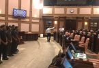 Security officers surround Speaker Maseeh inside the parliament chambers, seen on the left. PHOTO: AHMED NIHAN