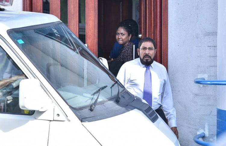 JP leader Qasim Ibrahim exits the Criminal Court after a hearing. PHOTO: HUSSAIN WAHEED/MIHAARU