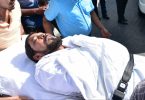 Maamigili MP Qasim Ibrahim carried out from the Criminal Court on a stretcher to the ambulance after he fainted during his hearing. PHOTO: HUSSAIN WAHEED/MIHAARU