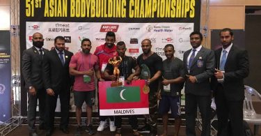 Shaaheen Ibrahim Didi (C) pictured with the trophy after he won the gold medal at the 51st Asian Bodybuilding and Physique Sports Championships 2017.