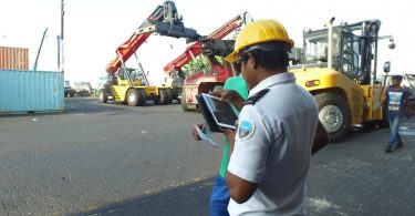 A Customs officer checks a cargo of imported goods. PHOTO/CUSTOMS