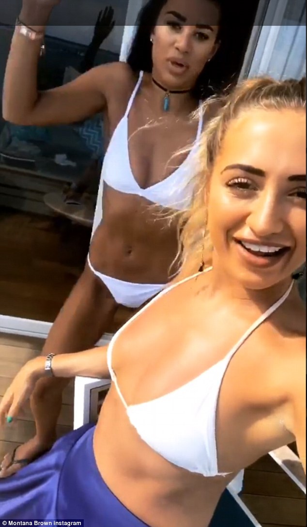 Blonde bombshell! Georgia, who held onto the camera, wore a similar bikini and opted for a purple cover-up below