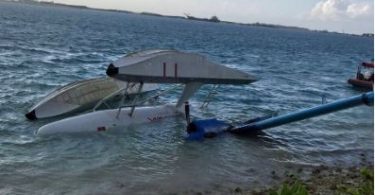 The Maldivian seaplane partly submerged in Hulhule lagoon after its crash landing. PHOTO/READER