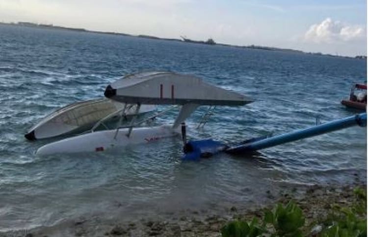 The Maldivian seaplane partly submerged in Hulhule lagoon after its crash landing. PHOTO/READER