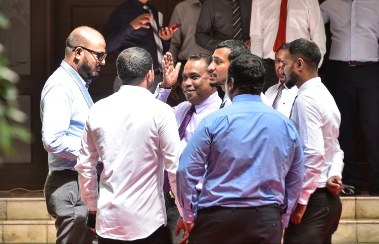 Lawmakers pictured outside the parliament house. PHOTO: HUSSAIN WAHEED/MIHAARU