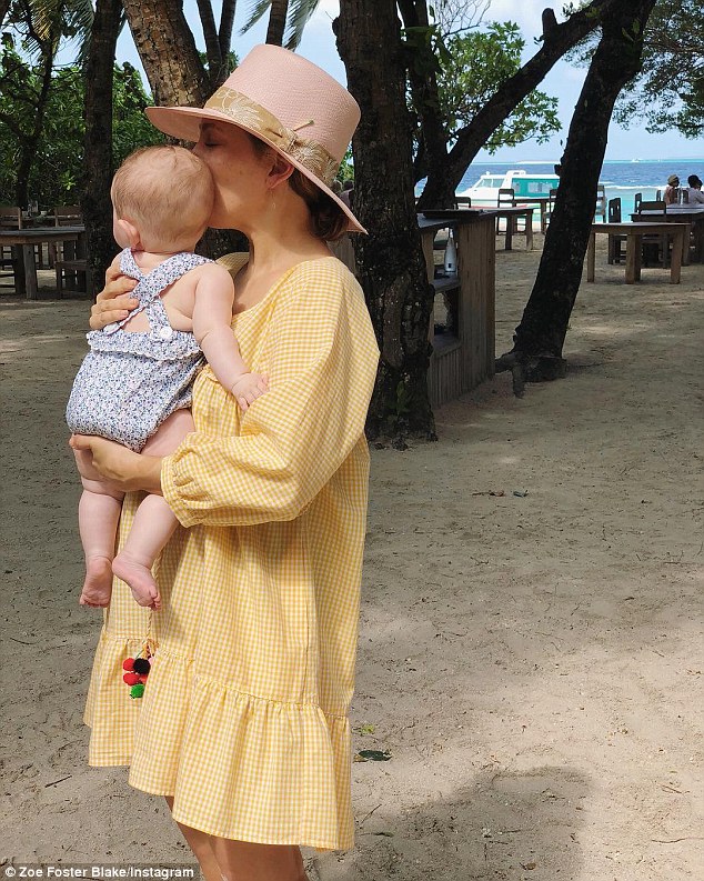 Work perks! The couple were in The Maldives as part of a work junket for Zoe, have also brought their children along - Sonny, three, and daughter Rudy, five months 
