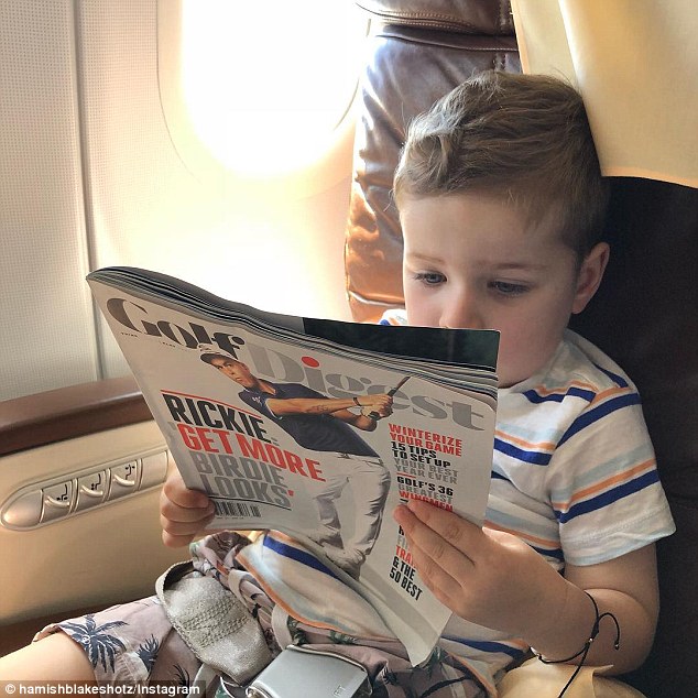 'Another champagne, sir?' Hamish Blake shares adorable photo of Sonny, 3, flying business class after $7000 a night Maldives holiday with wife Zoe