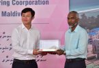 CMEC’s legal representative Liu Xiaodo (L) hands over the 1,500 housing units the company developed in the Maldives to housing minister Dr Mohamed Muizzu. PHOTO/HOUSING MINISTRY