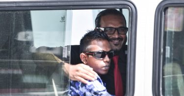 Ex-VP Ahmed Adheeb pictured inside a police vehicle as he is escorted back to Dhoonidhoo detention centre after his preliminary hearing at the Criminal Court. PHOTO: HUSSAIN WAHEED/MIHAARU