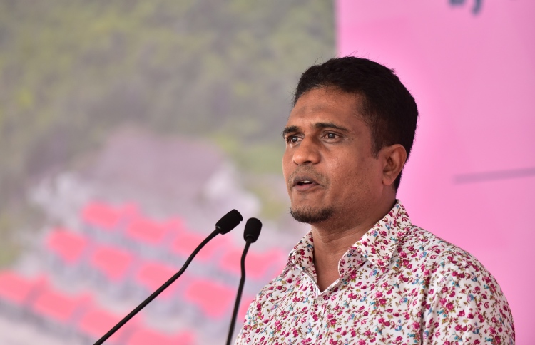 PPM's PG leader Ahmed Nihan speaks at the ceremony in which CMEC handed over 1,500 flats to the Maldivian government. PHOTO: HUSSAIN WAHEED/MIHAARU