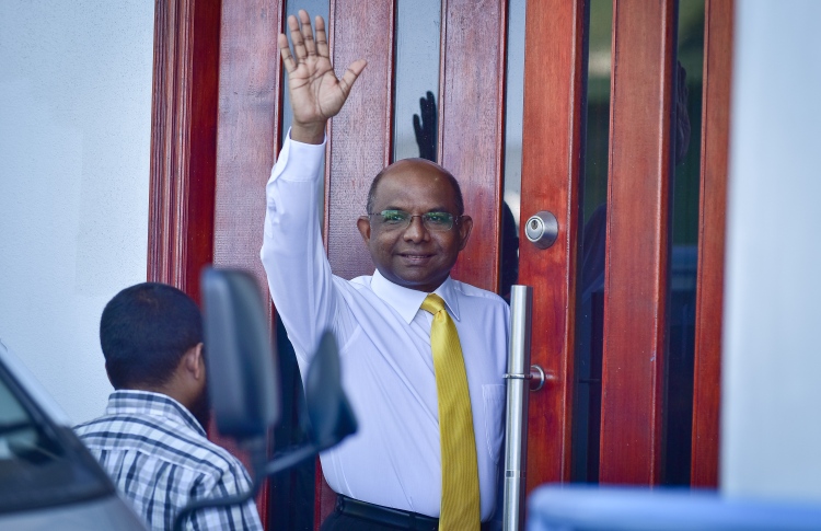 Henveiru North MP Abdulla Shahid waves before his hearing at the Criminal Court. PHOTO: NISHAN ALI/MIHAARU