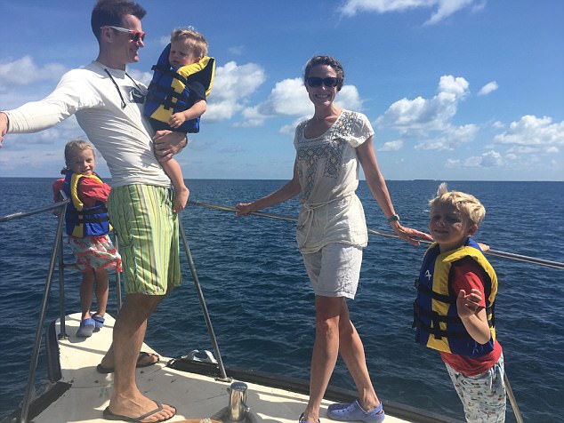 Guy, Katie and the children, who devoted hours to bobbing in the pool, building sandcastles on the beach, chasing lizards and paddling among shoals of tropical fish