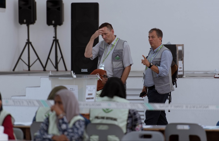 Foreign observers in Hithadoo, Addu City during voting