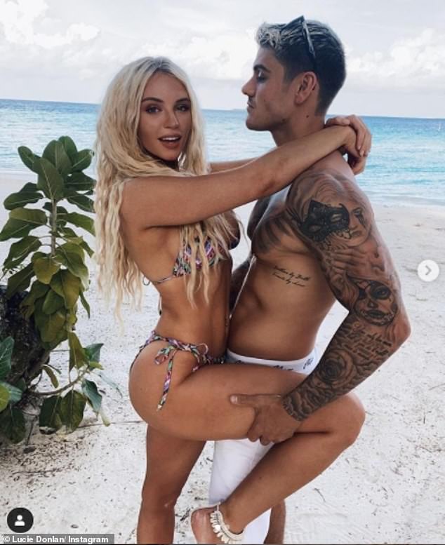 Looking good: The couple showcased their ripped physique in the PDA-filled beach images shared to Lucie's Instagram