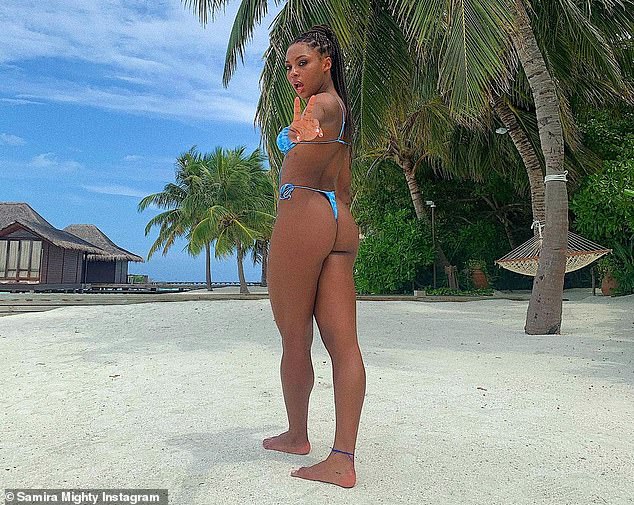 Cheeky: The TV personality's barely-there bottoms were tied high on her waist to show off her fit physique, and a cheeky snap from behind left little to the imagination